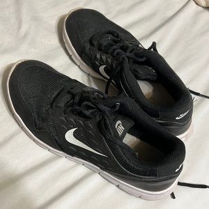 Slightly worn Nike tennis shoes